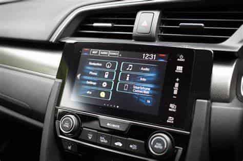 Do larger car infotainment display screens currently pose distractions for drivers?